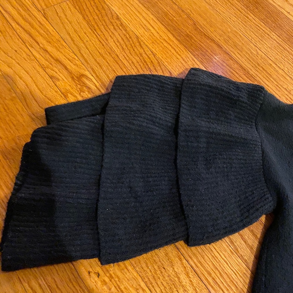 Three tier bell arm black sweater
